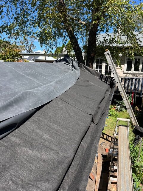 Waterproof pondliner was then pulled across the roof over the geofabric.