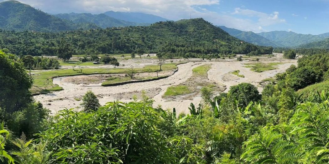 The Nyamugasani River flows through the flood plains in the foothills of Rwenzori Mountains National Park